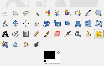 GIMP Toolbox – The Heal tool is featured by the band-aid icon.